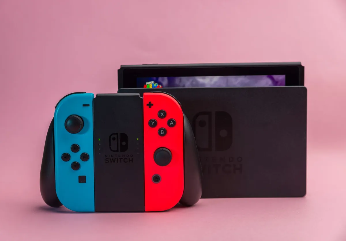 Nintendo Switch Lite turquoise + Animal Crossing — photo 1