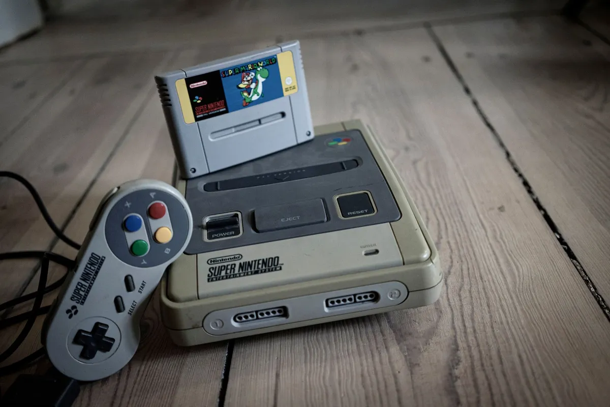 Super Nintendo en boîte + Mario World — photo 1